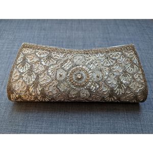 Silver beaded clutch